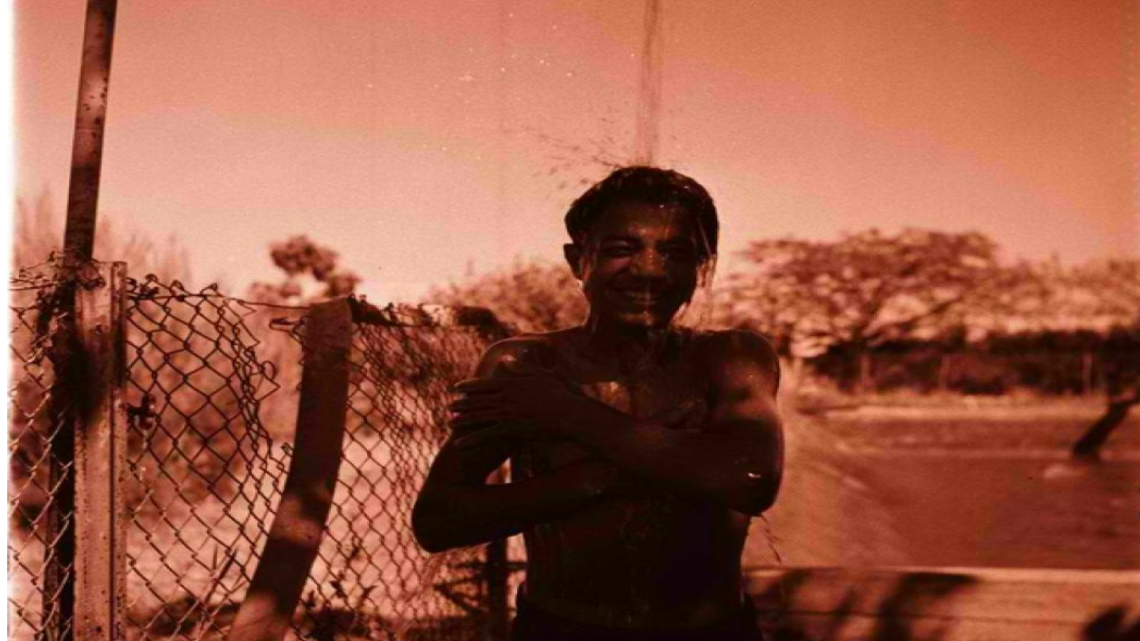 Beno Eisentrark collection: Ha-Oved youth in the shower, 1953 [State Archives]